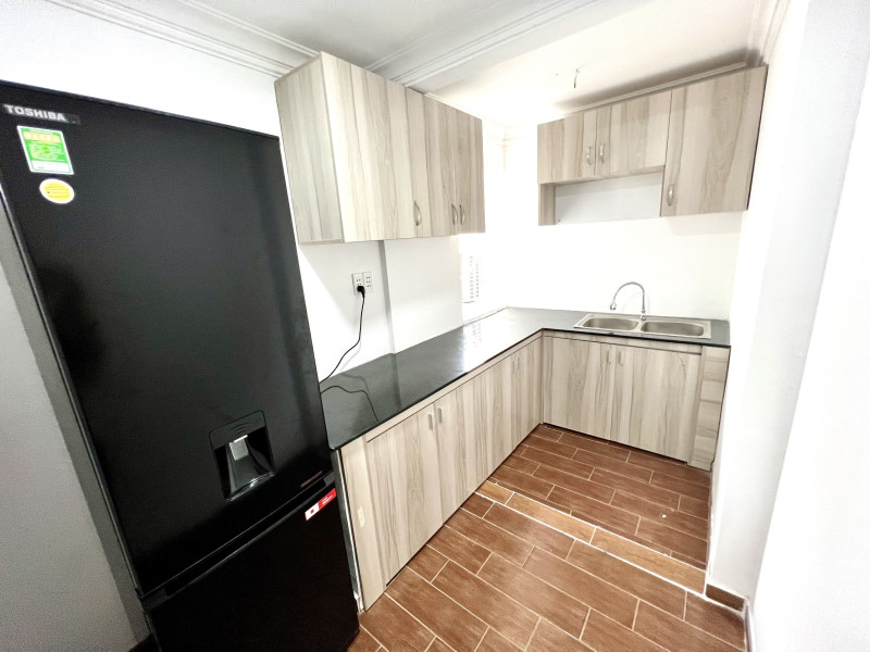 A Cozy Corner Two-Bedroom Home in Thao Dien