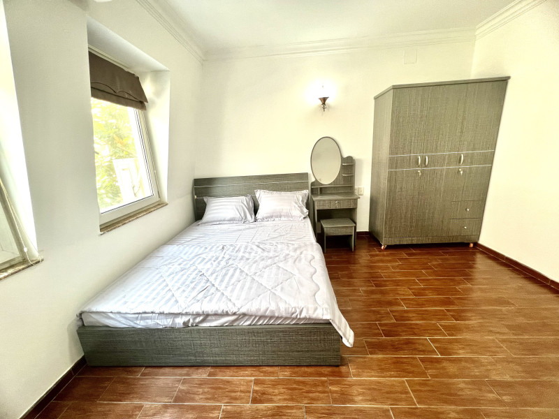 A Cozy Corner Two-Bedroom Home in Thao Dien