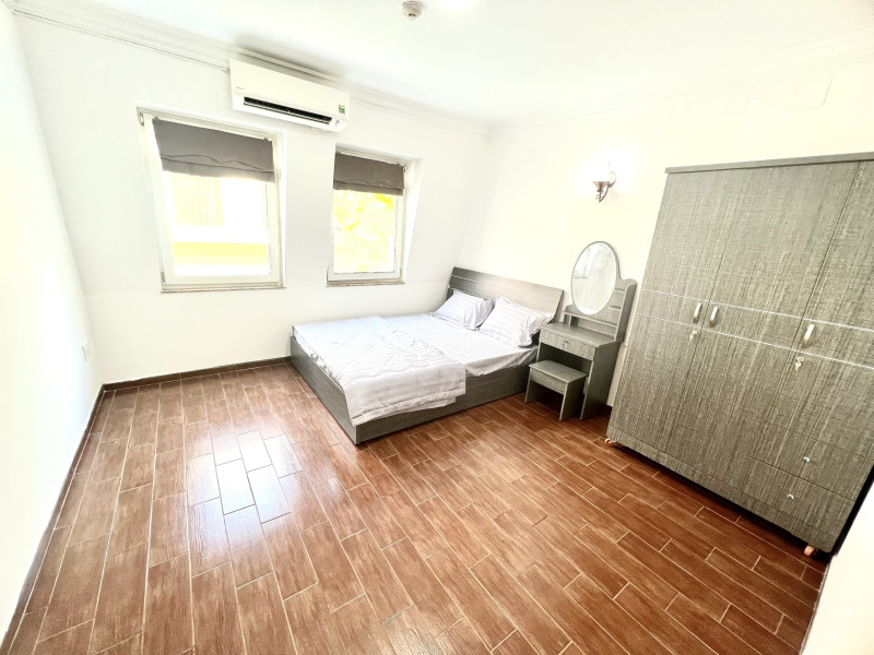 A Cozy Corner Two-Bedroom Home in Thao Dien