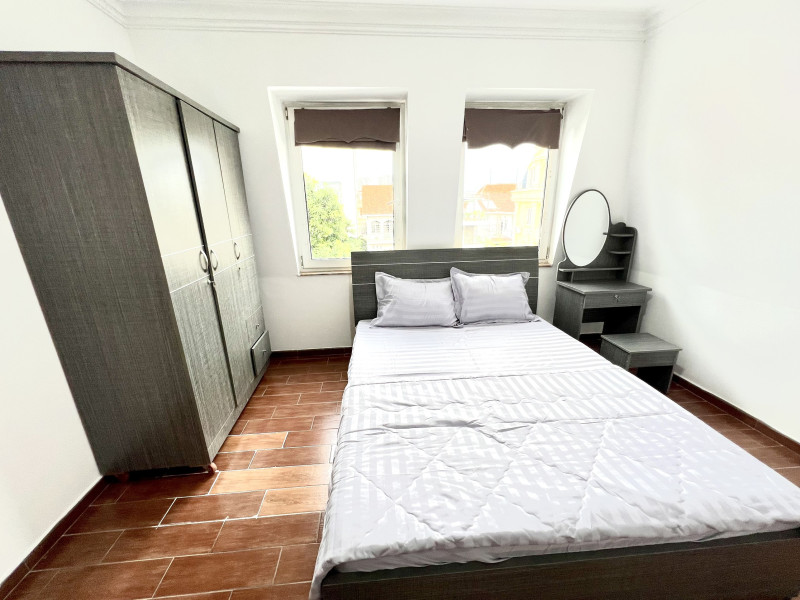 A Cozy Corner Two-Bedroom Home in Thao Dien