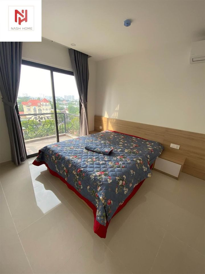 A Bright Two-Bedroom Living Space with Elegant Finishes