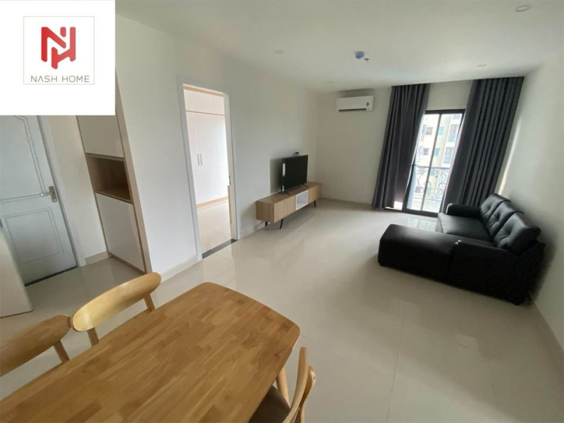 A Bright Two-Bedroom Living Space with Elegant Finishes