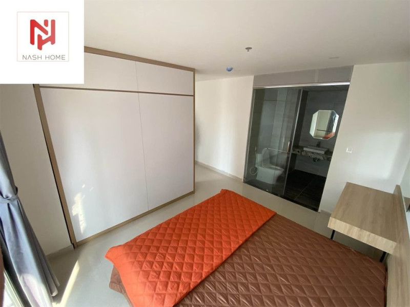 A Bright Two-Bedroom Living Space with Elegant Finishes