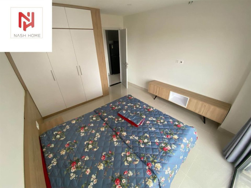 A Bright Two-Bedroom Living Space with Elegant Finishes