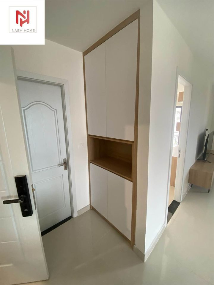 A Bright Two-Bedroom Living Space with Elegant Finishes