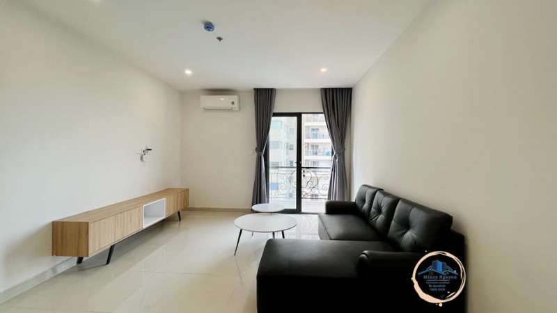 A Bright Two-Bedroom Living Space with Elegant Finishes