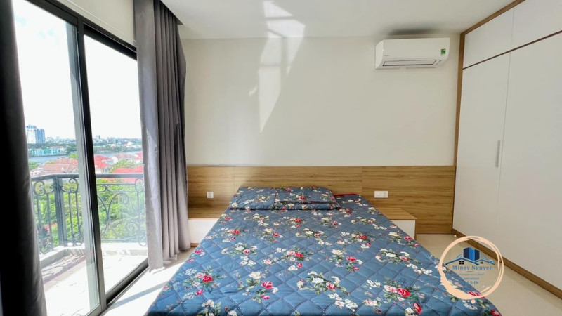 A Bright Two-Bedroom Living Space with Elegant Finishes