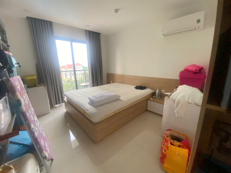 A Bright Two-Bedroom Living Space with Elegant Finishes