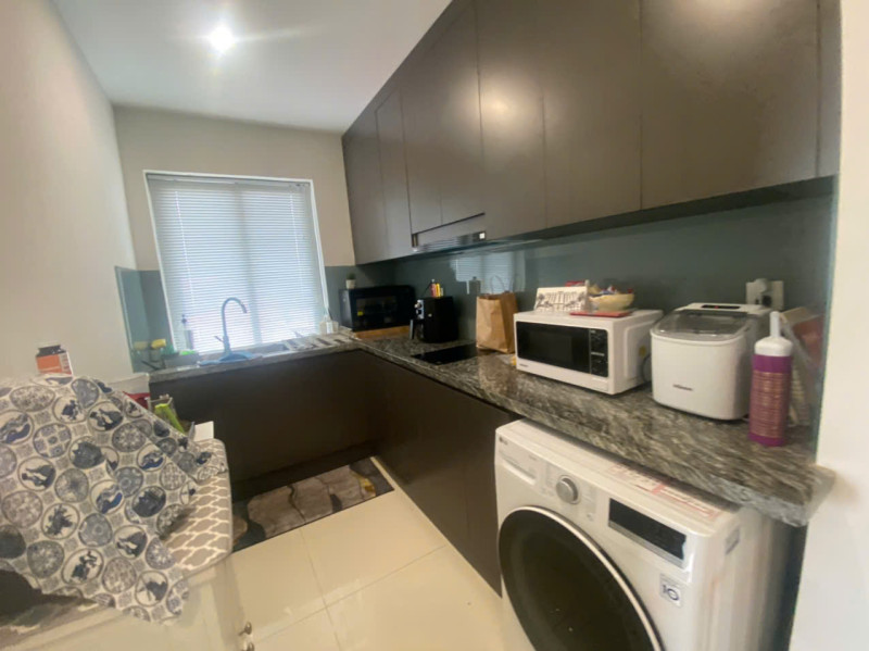 A Bright Two-Bedroom Living Space with Elegant Finishes