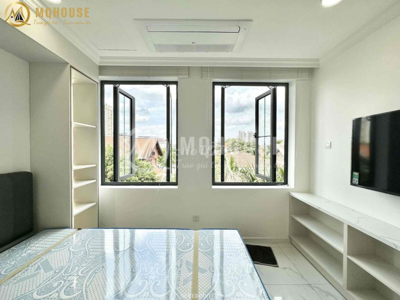 A Cozy Home Tucked in Thao Dien